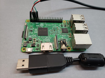 A Raspberry Pi 3 with a USB to TTL cable attached